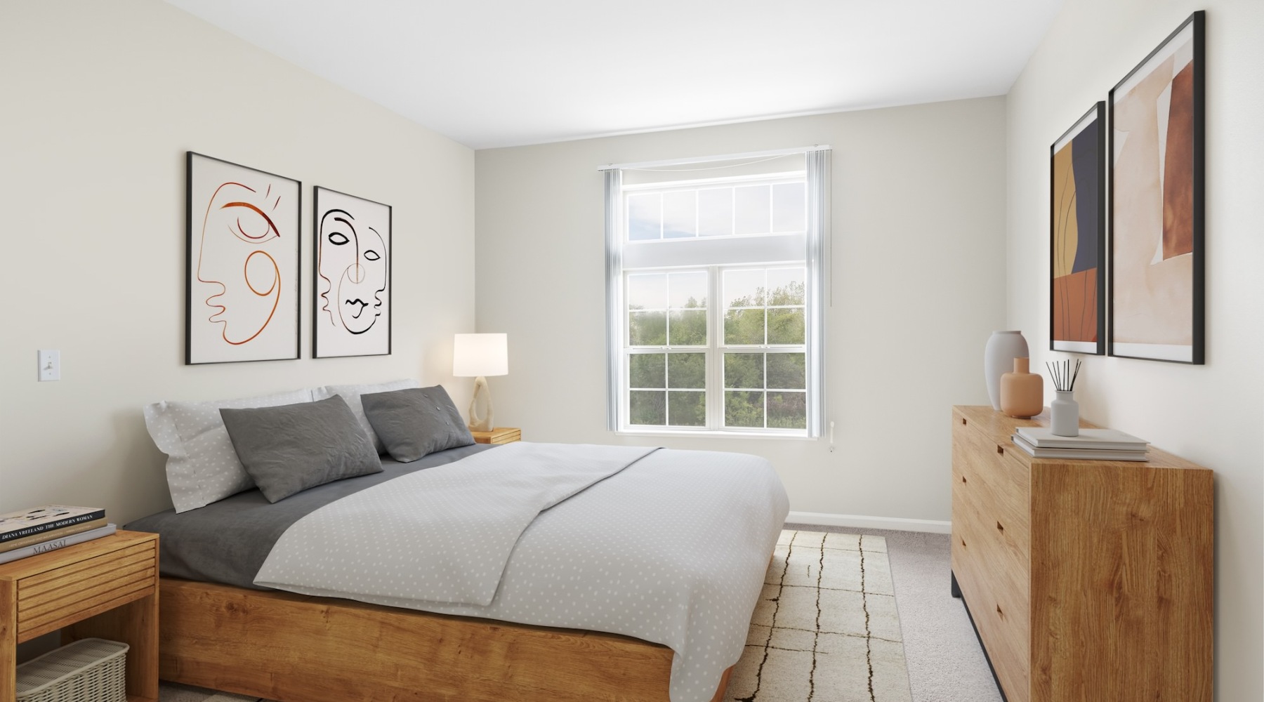 bedroom with a window and art on the walls
