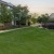 a large green lawn in front of a house