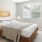 a bedroom with a large bed