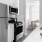 a kitchen with white cabinets