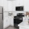 a kitchen with white cabinets